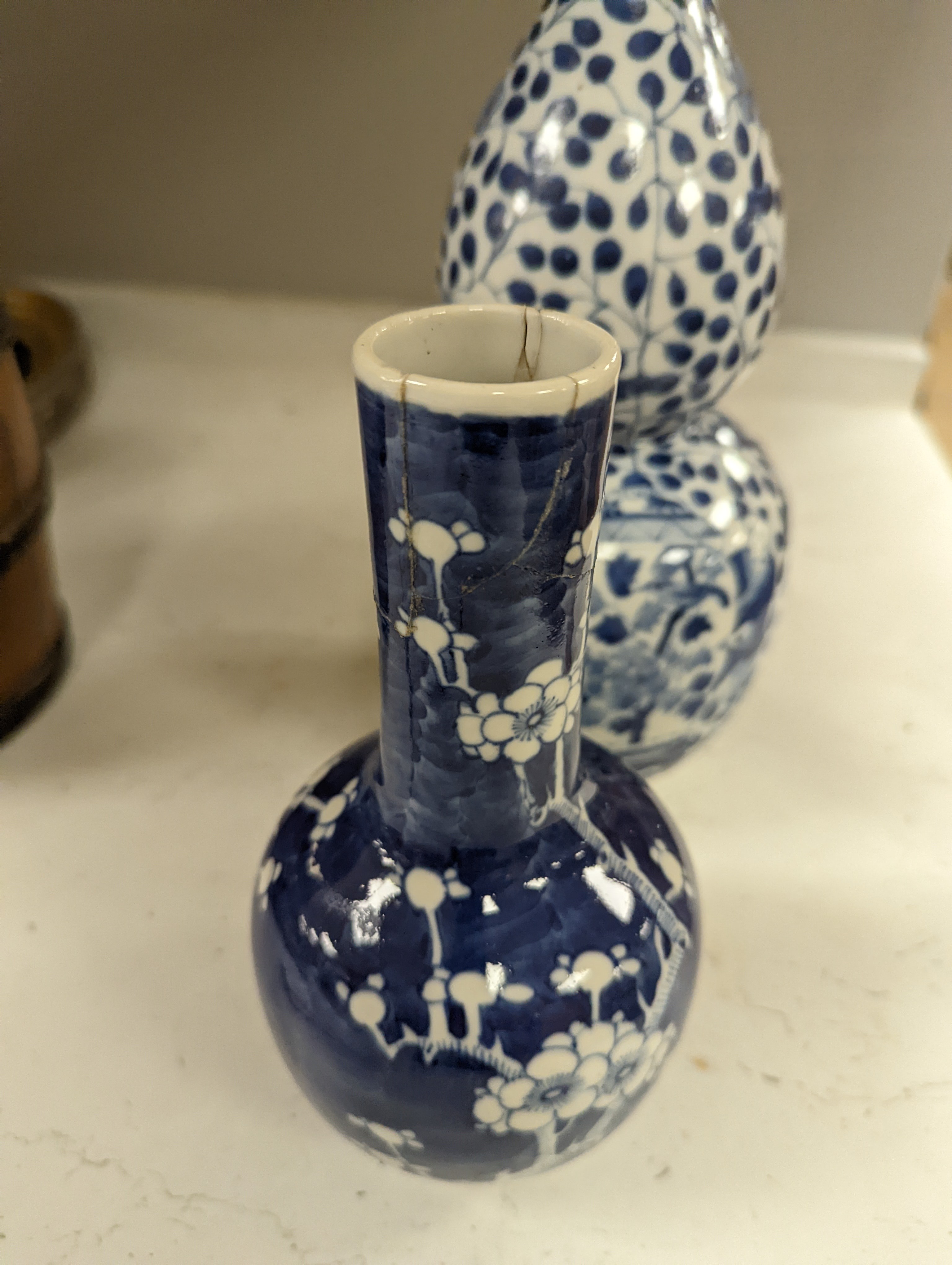 Two Chinese blue and white vases, tallest 29cm